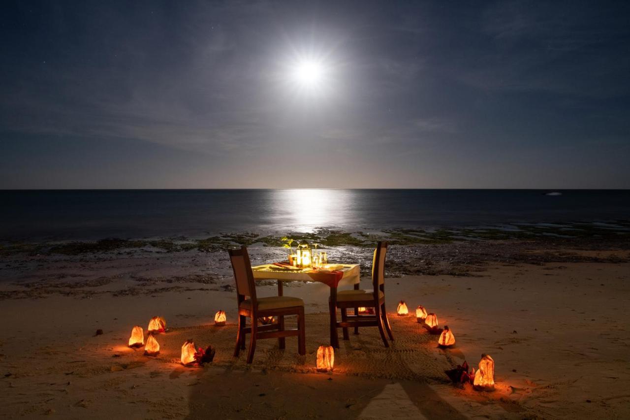 Nungwi Dreams By Mantis Hotel Exterior photo A beachside dinner at the resort