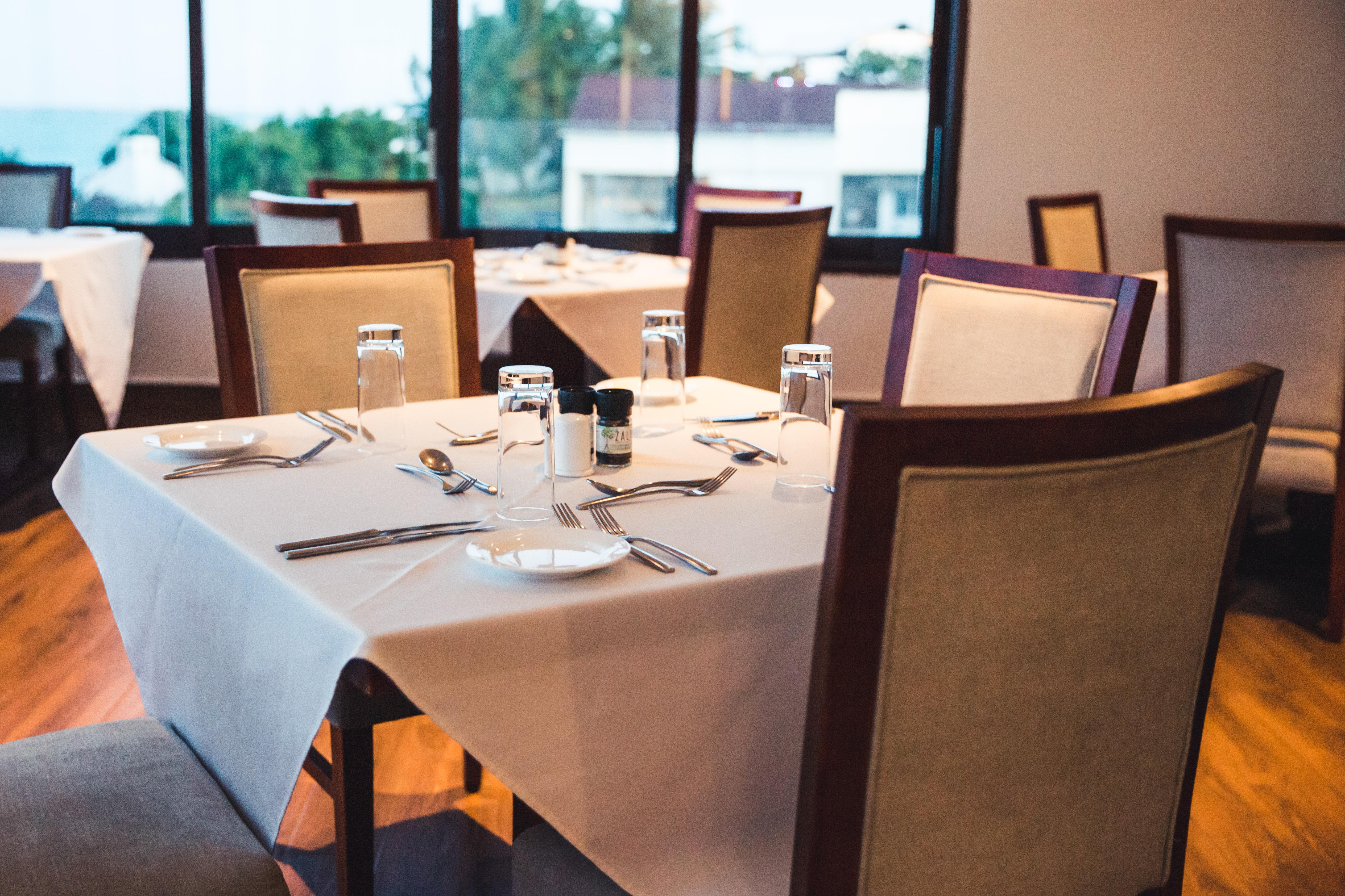 Nungwi Dreams By Mantis Hotel Exterior photo A restaurant table with a white tablecloth
